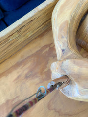 Wooden Man Fishing in a Bathtub by Hy Farber